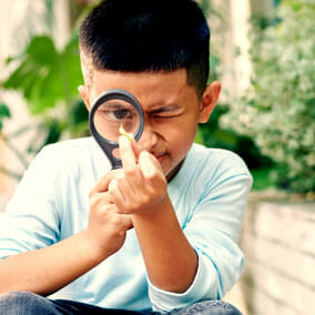Kid exploring nature MBK Group Consultants: Focused