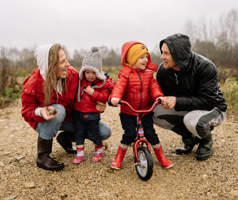 boy with family outdoors fresh air bikes