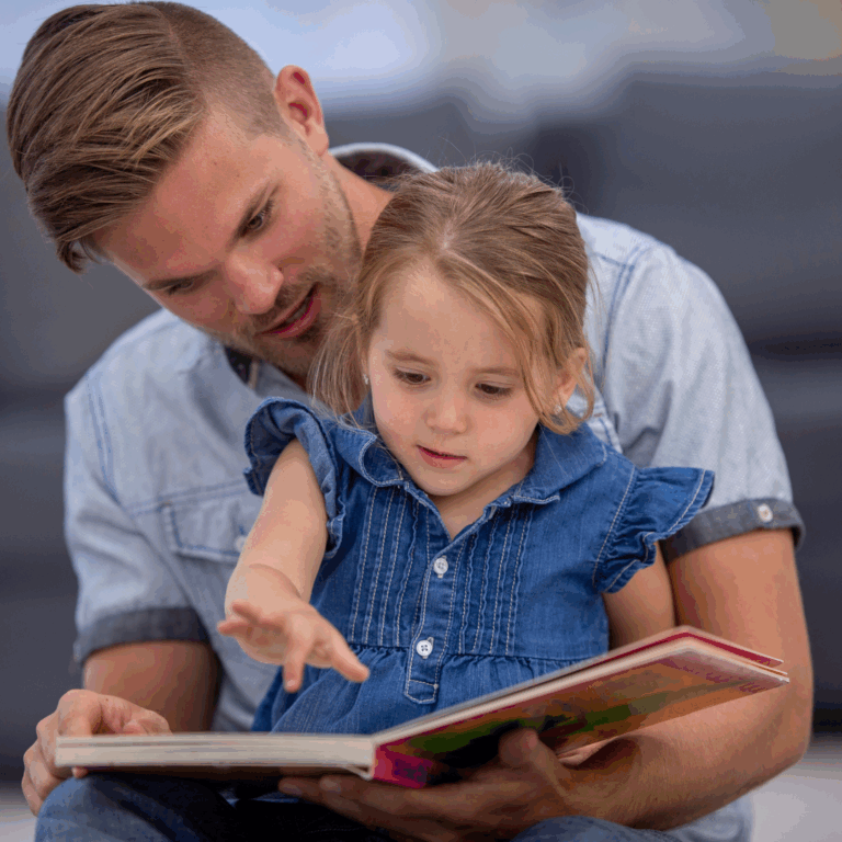 Parent reading a book to a child