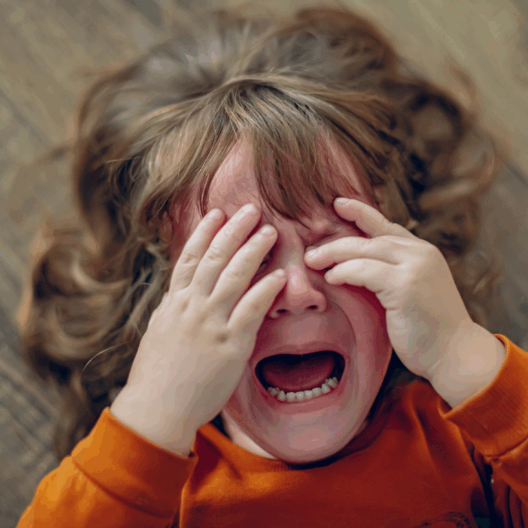 An emotional 2 year old experiencing frustration