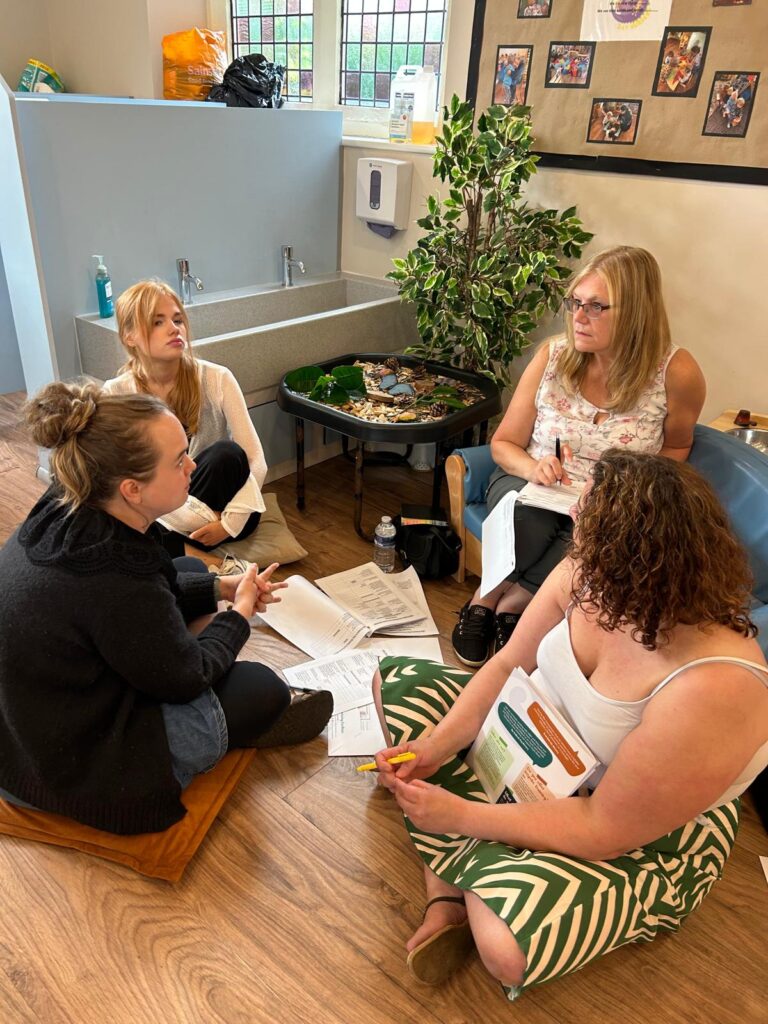 mbk training in action in a small area of the setting in a small group discussion