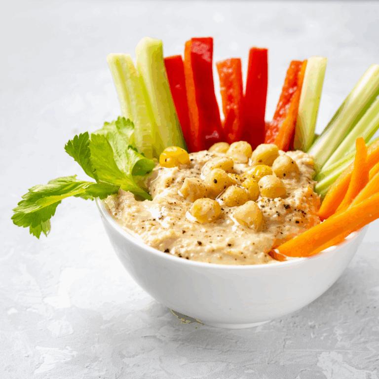 A bowl of hummus and crudites