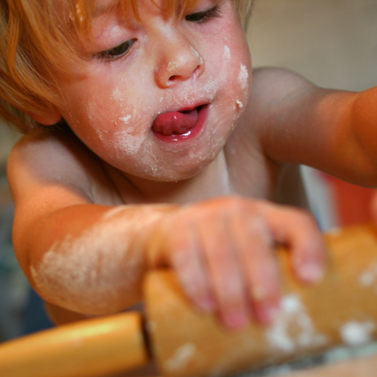 TODDLER ENGAGED FOCUS BAKING BREAD