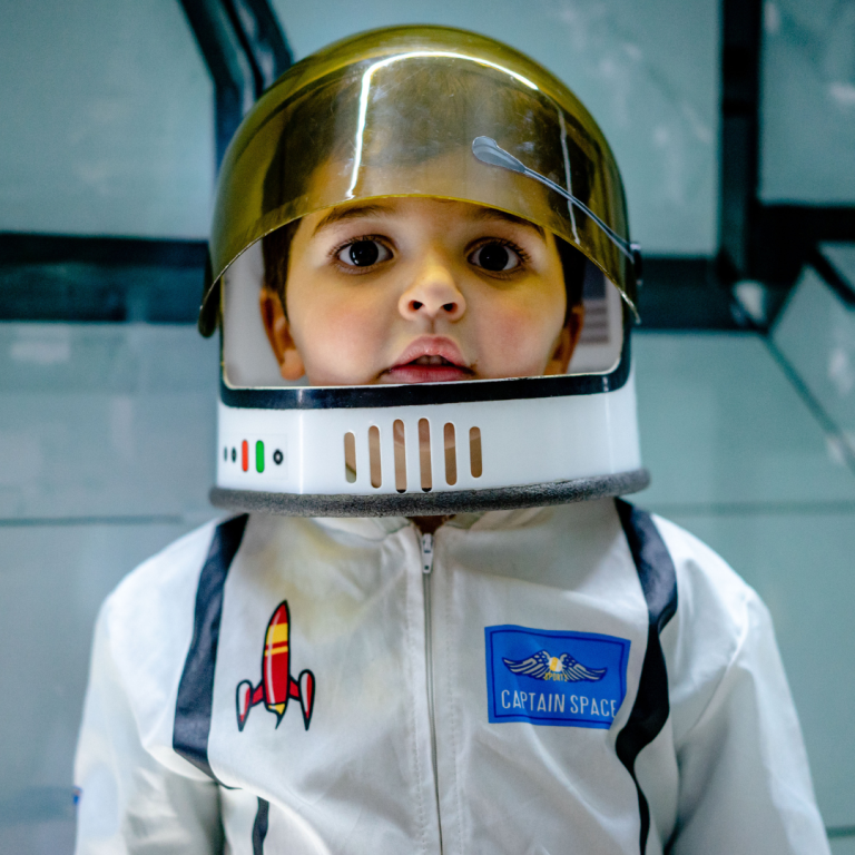 A preschooler dressed as an astronaut