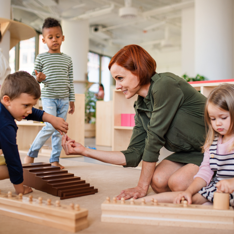 A practitioner with nursery children