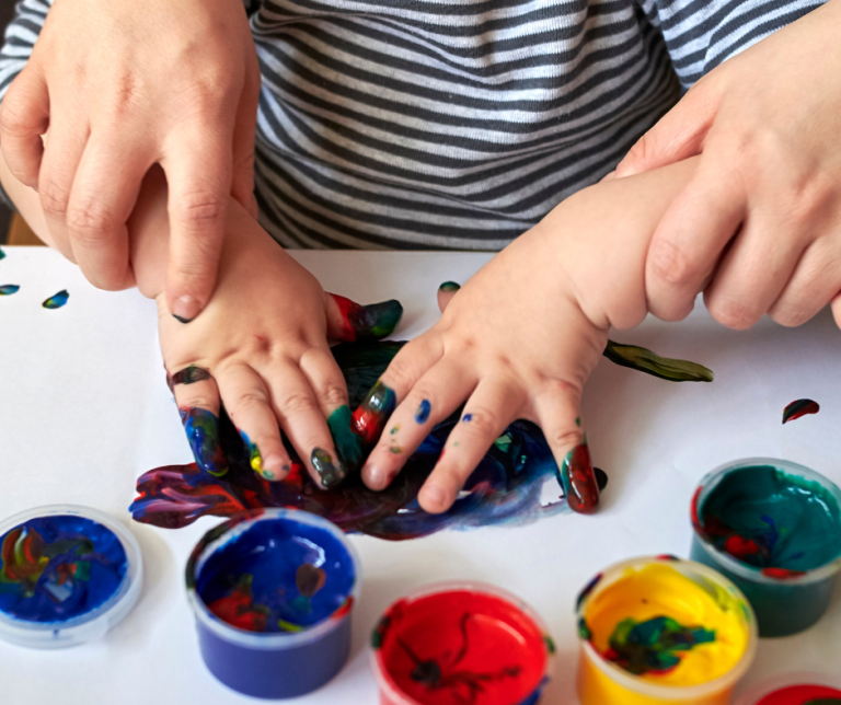 A child finger painting