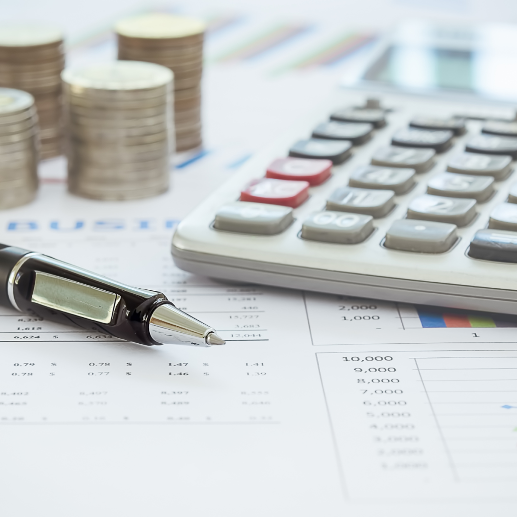 A pen, a calculator and money